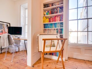 A quiet, light-filled study space — a moment of reflection before the search begins.