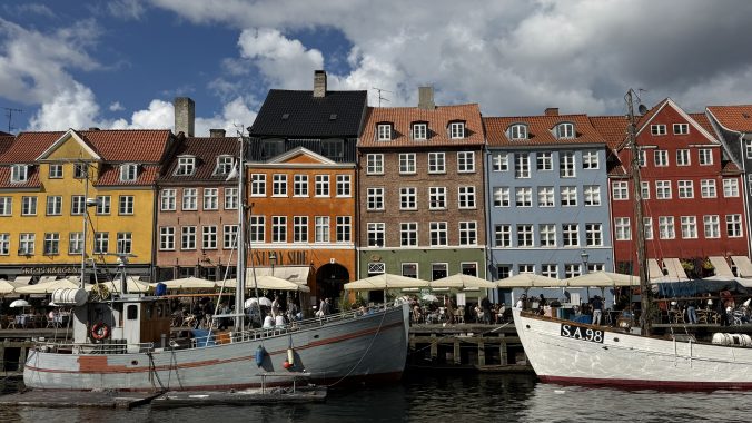 Harbour view with boats and wide July sky