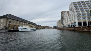 On the waterways of Copenhagen, modern homes and older buildings