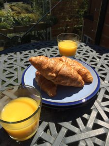 Croissants + juice outside